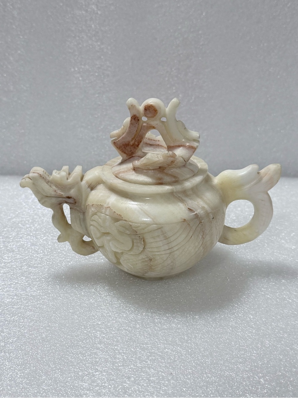 Vintage decorative, hand-carved stone teapot